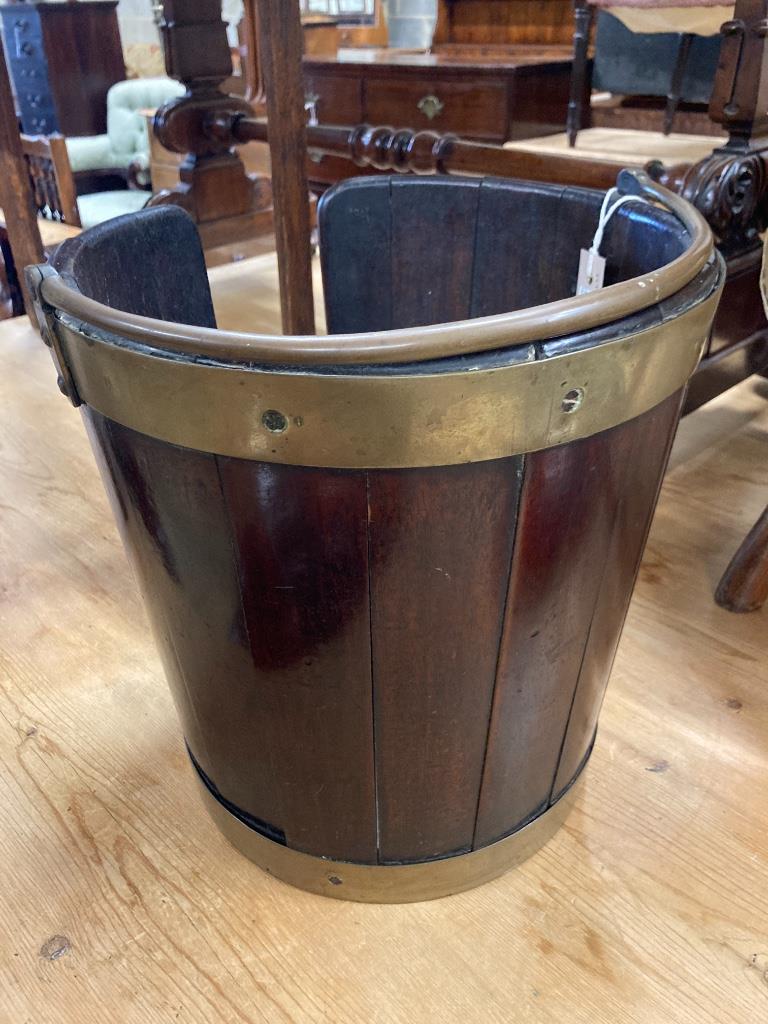 A George III brass bound staved mahogany plate bucket, 33cm diameter, height 33cm